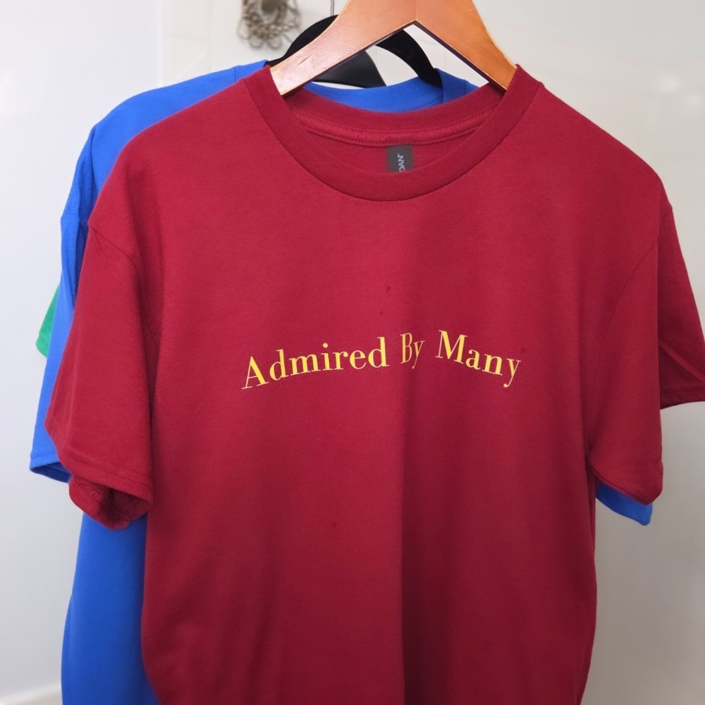 Admired by Many™ T-Shirt – $25..00- UNISEX